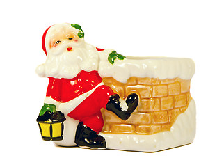 Image showing Ceramic toy Santa Claus. Christmas gift symbol.