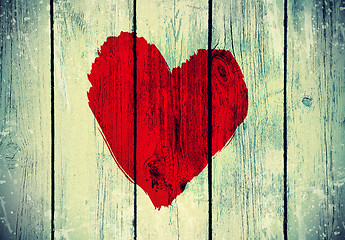 Image showing love symbol on old wooden wall