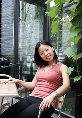 Image showing Korean woman in garden