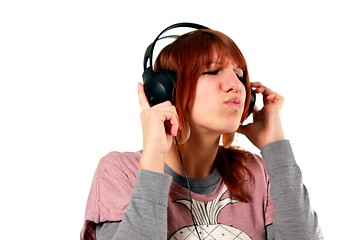 Image showing girl hearing music