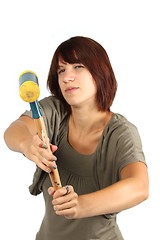 Image showing girl with hammer