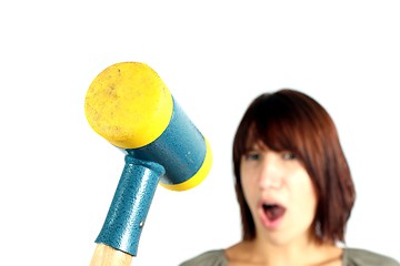 Image showing girl with hammer