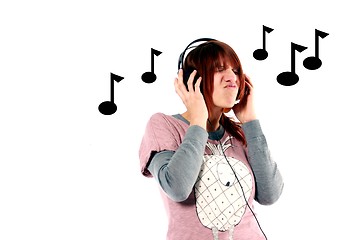 Image showing girl hearing music