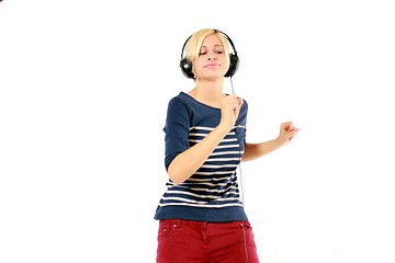 Image showing girl hearing music