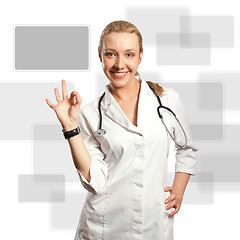 Image showing young doctor woman shows ok