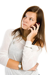 Image showing Pretty woman talking by mobile phone