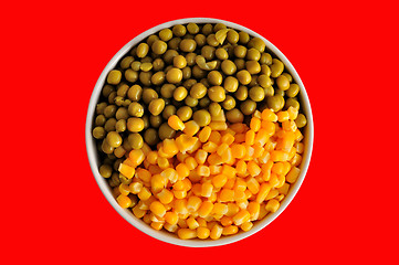 Image showing corn and peas on red