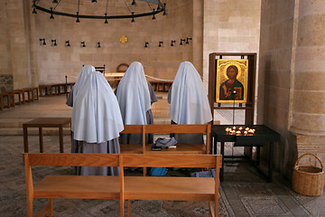 Image showing Praying nuns