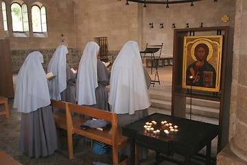 Image showing Praying nuns