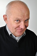 Image showing senior man with ironic face expression