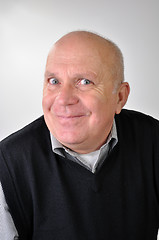 Image showing senior man making funny faces