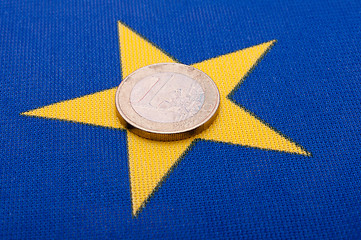 Image showing Euro Coin on EU Flag