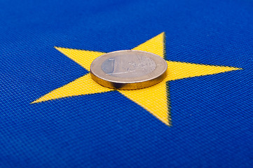 Image showing Euro Coin on EU Flag