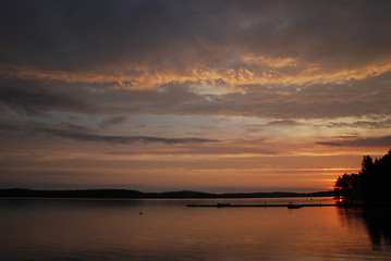 Image showing Sunset colours of the sky and water of lake Kuuhankavesi in Cent