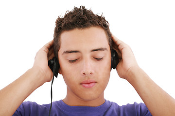 Image showing Boy listening to the music, isolated on white