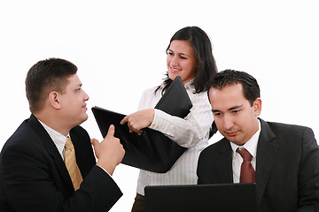 Image showing Business people discussing the growth of income at a table in th