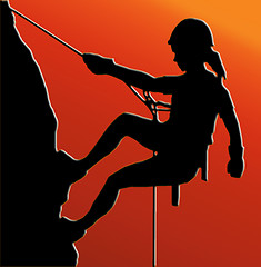 Image showing Sunset Back Abseiling Lady