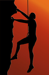 Image showing Sunset Back Abseiling Man