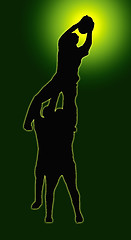 Image showing Green Glow Sport Silhouette - Rugby Players Supporting Lineout J