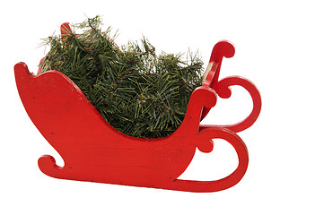 Image showing Red Wooden Sleigh And Greens