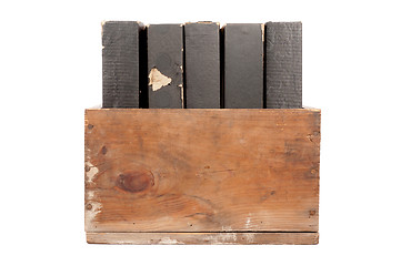 Image showing Old Wood Box With Player Piano Rolls