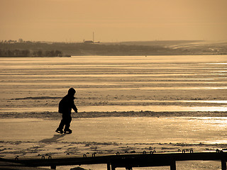 Image showing skating on a river