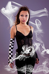 Image showing young and beautiful woman, with smoke effects