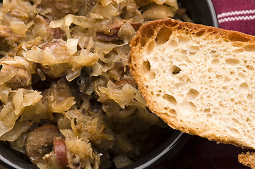 Image showing traditional polish sauerkraut (bigos) with mushrooms and plums