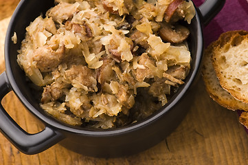 Image showing traditional polish sauerkraut (bigos) with mushrooms and plums