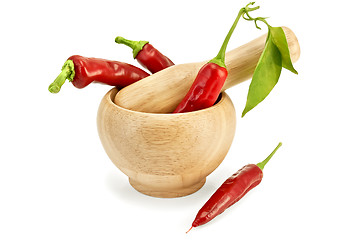 Image showing Fresh chili peppers in mortar