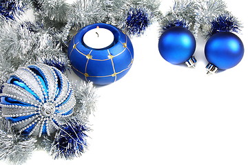 Image showing Christmas still life with blue balls and tinsel.