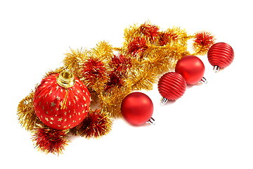 Image showing Christmas balls and a gold tinsel.