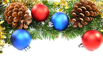 Image showing Christmas balls against the backdrop of tinsel.