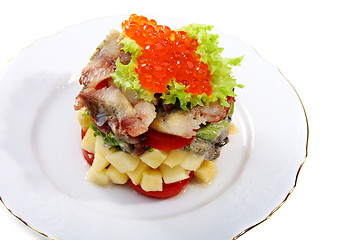 Image showing Salad with smoked herring and salmon roe.