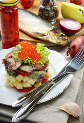 Image showing Salad with smoked herring and salmon roe.