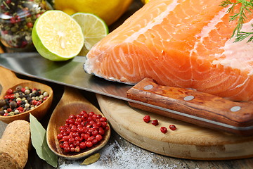 Image showing Fresh salmon fillet with herbs and spices.