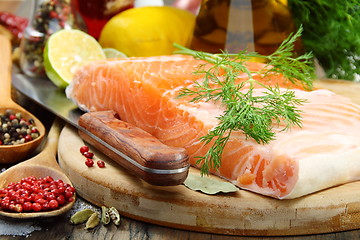 Image showing Fresh salmon fillet with herbs and spices.