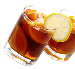 Image showing Hot black tea with orange.