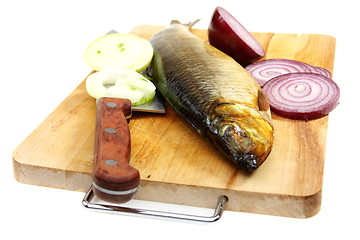 Image showing Smoked herring on the kitchen board.