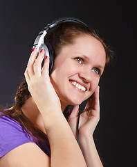 Image showing smiling girl in the headphones