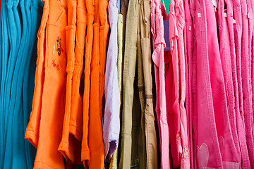 Image showing children's trousers on a hanger in the store