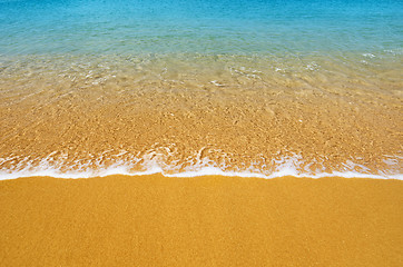 Image showing Surf on tropical beach - background