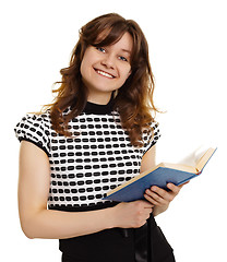 Image showing Smiling girl with a book isolated on white