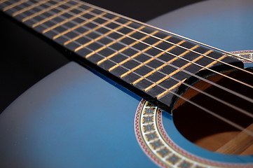 Image showing blue music guitar for playing party music 