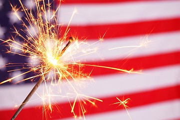 Image showing sparkler and usa flag