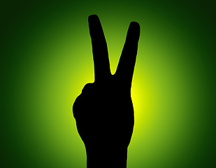 Image showing Silhouette Piece Hand on Green Colored Background