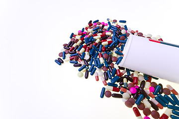 Image showing pills spilling out of container 