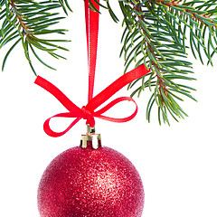 Image showing red christmas ball hanging from tree
