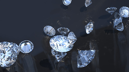 Image showing Precious gems: group of diamonds rolling over