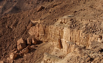 Image showing Weathered cracked wall of desert canyon